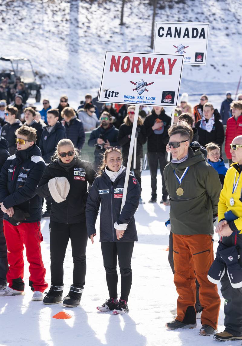 Members of Team Norway stand during the playing of their national anthem during the opening ceremonies of the Norge Annual Winter Ski Jump Tournament on Sunday, January 26, 2025 at the Norge Ski Jump in Fox River Grove.