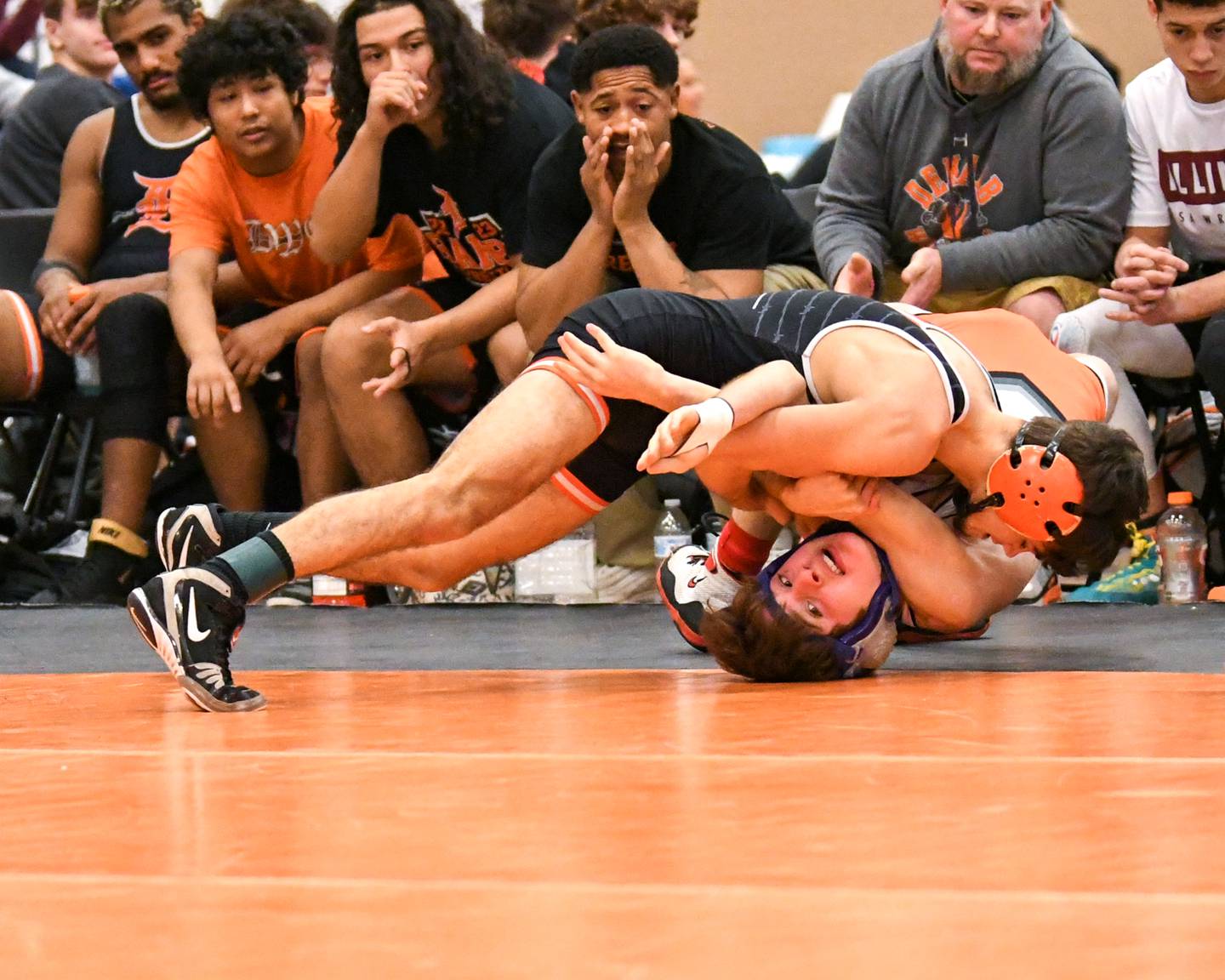 DeKalb’s wrestler Kaden Klapprodt pins St. Charles East Liam Aye during the first round in the 113 weight class held on Friday Dec. 30th during The Don Flavin wrestling Invite held at DeKalb High School.