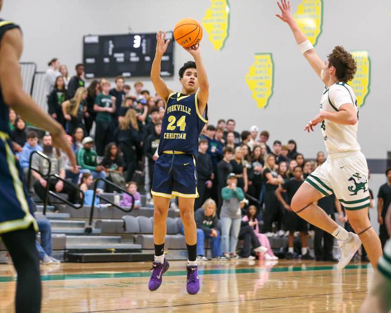 Yorkville Christian's Jayden Alford (24) shoots a jump shot during their Class 2A Seneca Sectional final basketball game between Bishop McNamara at Yorkville Christian, March 6, 2026 in Senaca.