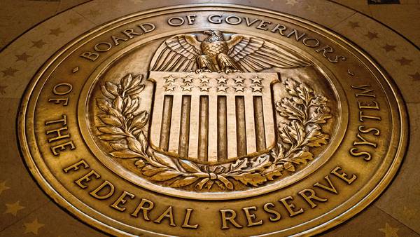 Federal Reserve cuts key rate by quarter-point and signals two more cuts this year
