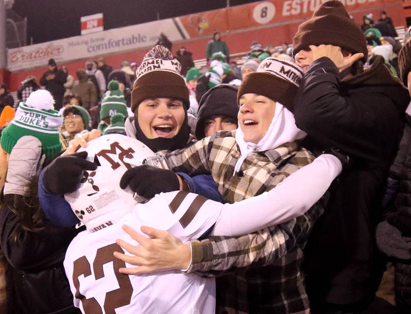 Mt. Carmel players celebrate with their fans after their Class 8A state championship win over Batavia Saturday, Nov. 30, 2024, in Hancock Stadium at Illinois State University in Normal.