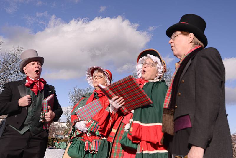 Christmas Carolers (left-right) Anthony Cesaretti, Maureen Kordesh, Liz Pazik and Bill Kavanagh  sing to families attending the Glen Ellyn Park District's Polar Market held at Maryknoll Park Saturday, Dec. 9, 2023.