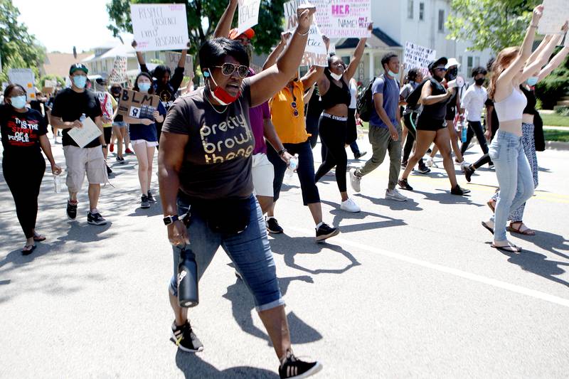 A Black Lives Matter peaceful protest and march was held in Downers Grove on June 7 in response to the killing of George Floyd, an unarmed black man while in police custody in Minneapolis last month.