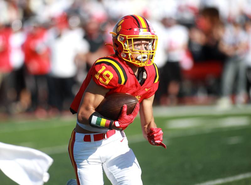 Batavia’s Zach Granberg carries the ball during the Class 7A second round playoff game against Lincoln-Way Central in Batavia on Saturday, Nov. 4, 2023.