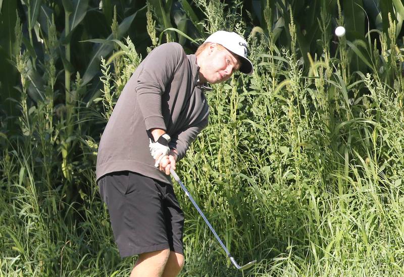 DeKalb's Aiden Lange chips onto the 5th green Tuesday, Aug. 9, 2022, during golf practice at River Heights Golf Course in DeKalb.