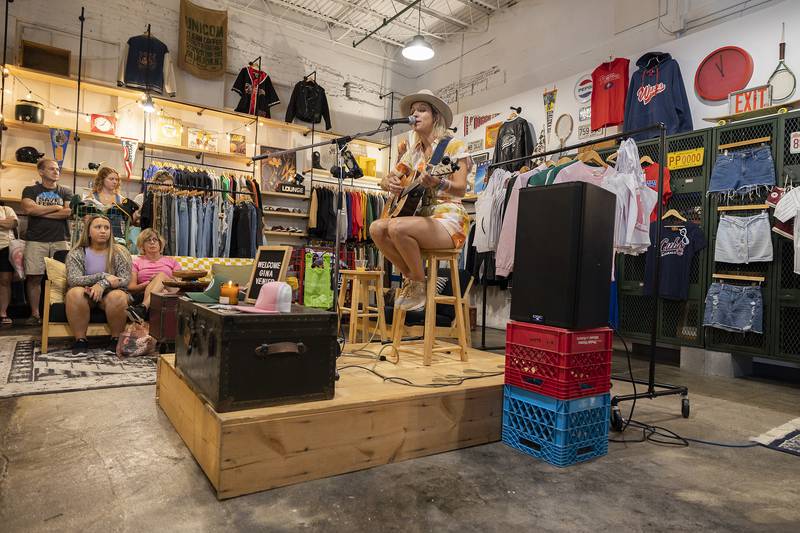 Nashville singer and Dixon native Gina Venier plays a special showing at Rack City Saturday, July 1, 2023 in Dixon. Rack City is a thrift shop opened by Hannah Wilson located at 116 East First Street. Venier will also appear on stage at Petunia Fest Sunday night.