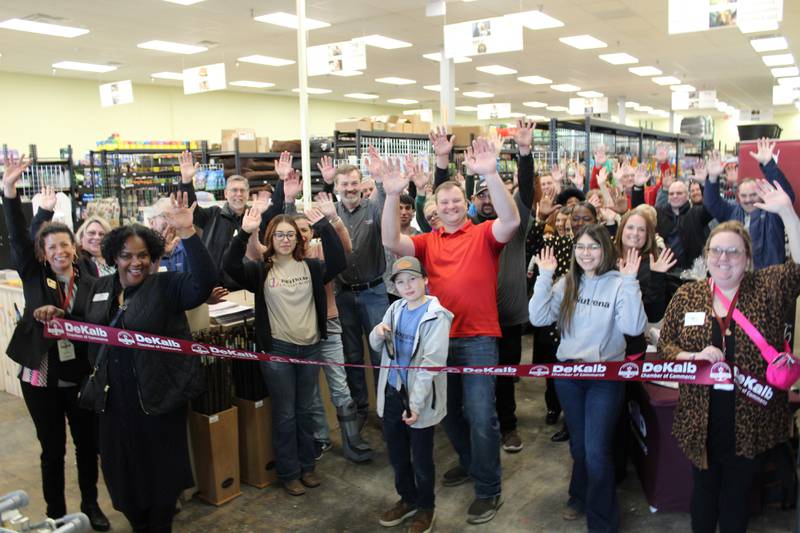 The DeKalb Chamber of Commerce celebrating Brothers Country Supply's grand opening