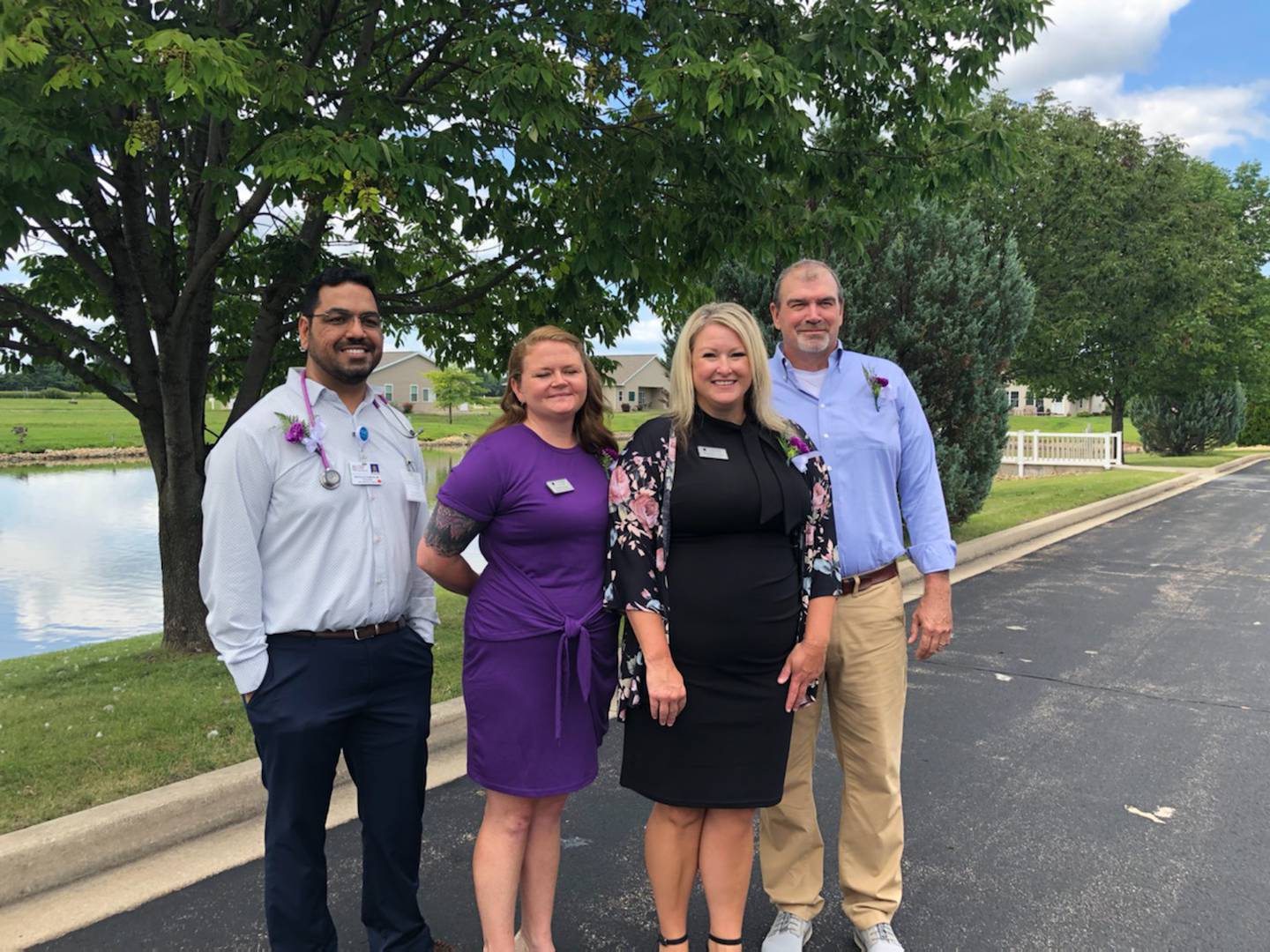 Liberty Village Medical Director Dr. Pamnani, Marketing Director Christa Hunt, Administrator Jennifer Diaz and Mayor Joel Quiram come out for the Liberty Village Ribbon Cutting.