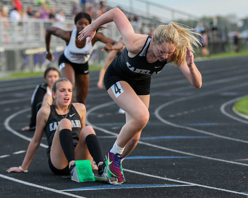 Kaneland's Matilyn Mumm takes off from the blocks in the 400m during the Interstate Eight conference meet at Plano High School.  May 9.2022.