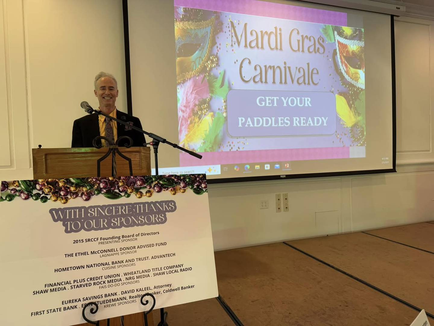 Fran Brolley, CEO of Starved Rock Country Community Foundation, speaks Saturday, March 1, 2025, during the Mardi Gras Carnivale fundraiser at Senica's Oak Ridge in rural La Salle.