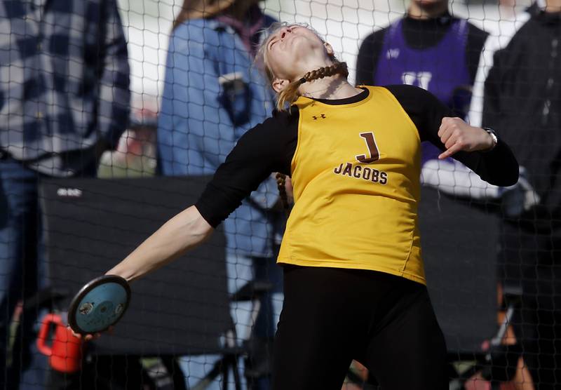 Jacobs’s Carly Uehlein throws the discus  on Thursday, May 7, 2026, during the Fox Valley Conference Girls Track and Field Meet at Huntley High School.