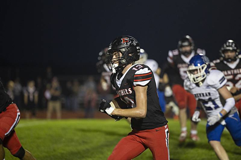 Erie-Prophetstown’s Connor Keegan finds running room against Newman Friday, Sept. 22, 2023 in a game at Erie.