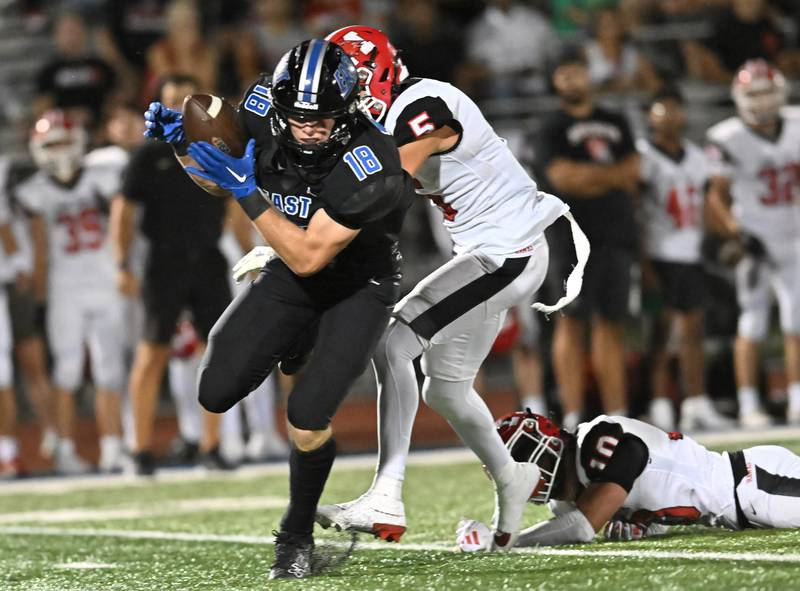 Lincoln-Way East's Sean Lefevour hauls in a catch for a big gain during a non-conference game against Maine South on Friday, Aug. 30, 2024, at Frankfort. (Dean Reid for Shaw Local News Network)