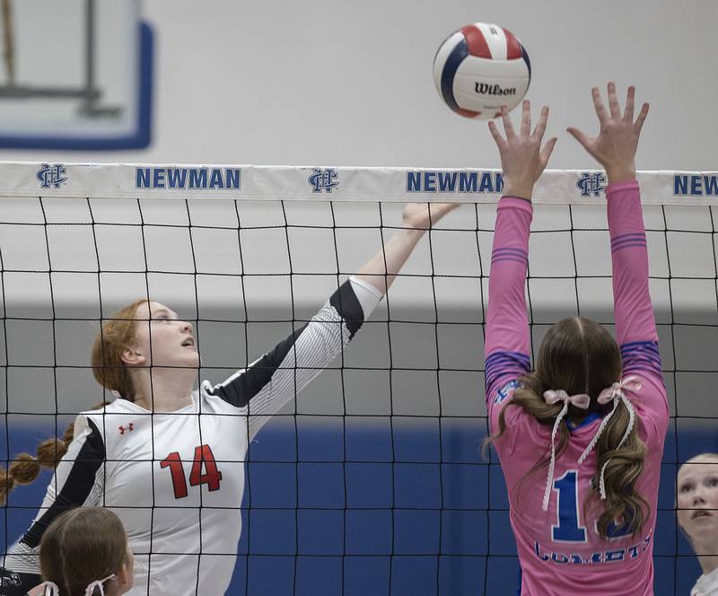 Erie-Prophetstown’s Eden Jensen plays a shot against Newman’s Kennedi Shippert Tuesday, Oct. 14, 2025.