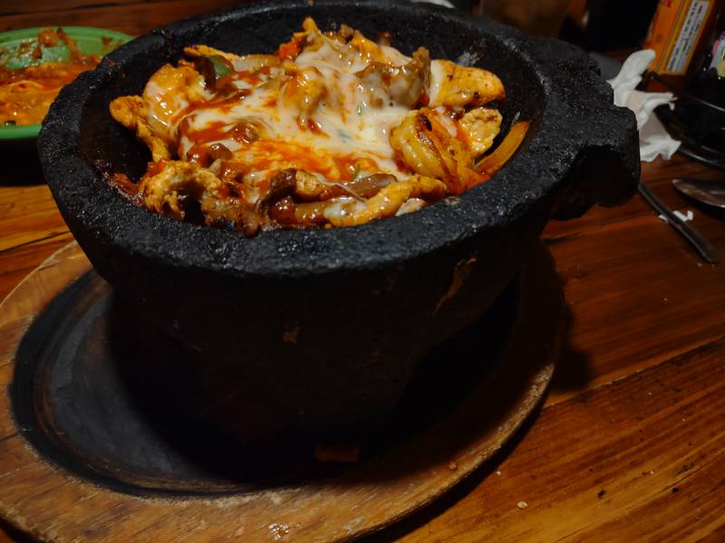 The molcajete at La Fondita Mexican Grill in Ottawa is served with steak, chicken and shrimp grilled with peppers, onions and tomatoes and topped with Monterrey Jack cheese and special red sauce.