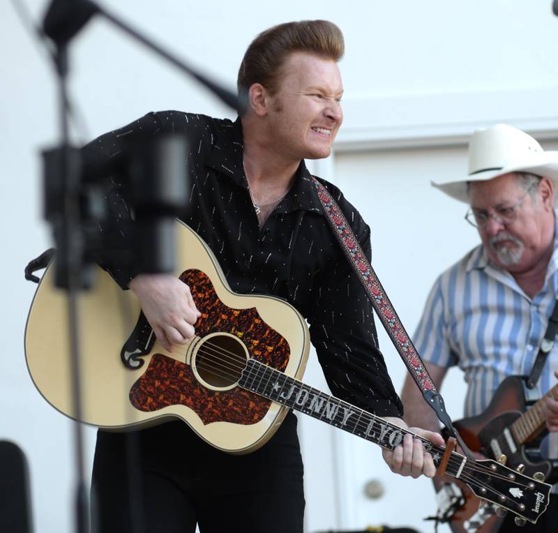 Jonny Lyons interacts with the crowd as he sings with his band the Pride at the Mt Morris Jamboree on Friday, June 27, 2025.