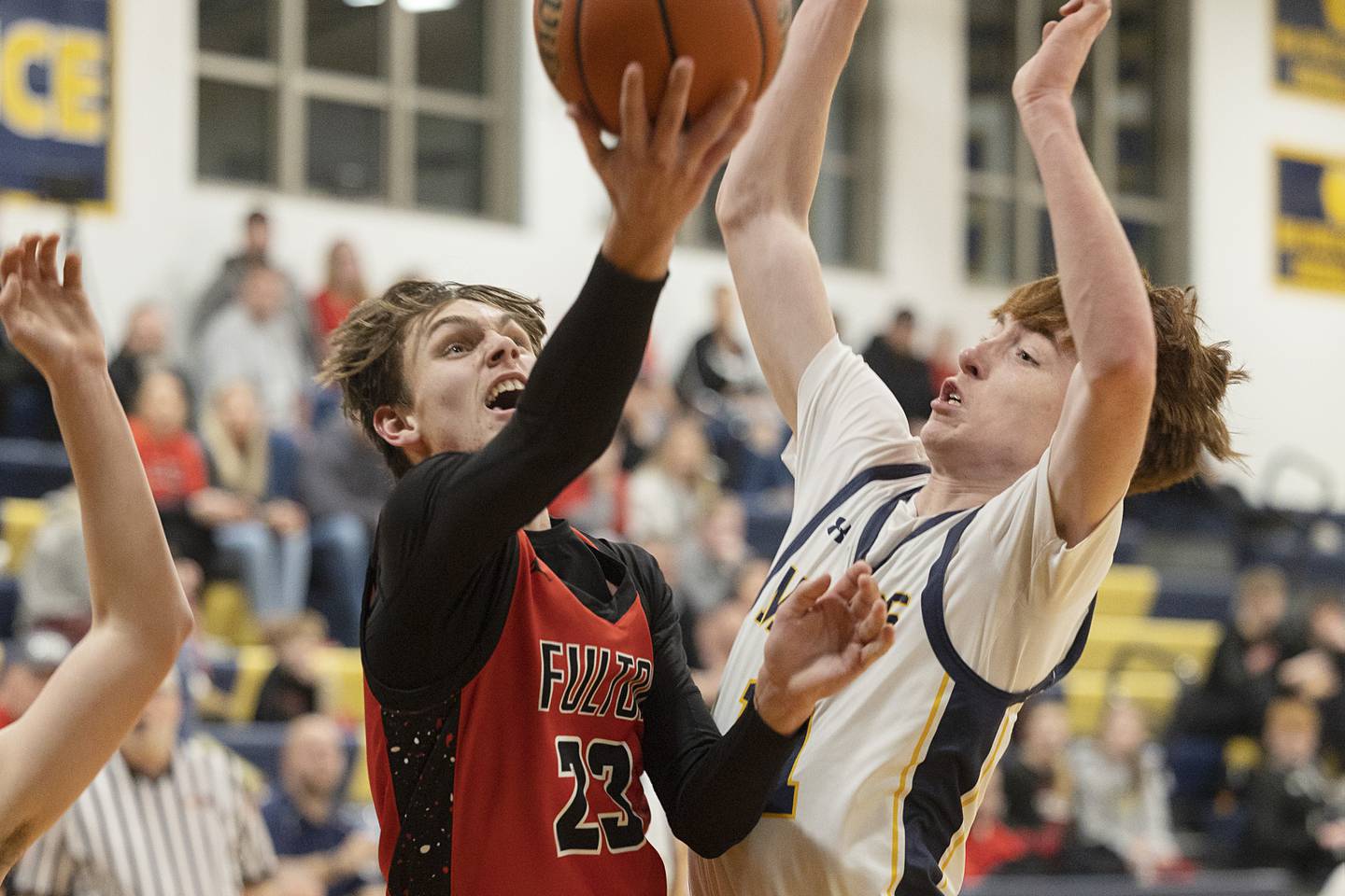 Fulton’s Brady Read puts up a shot against Polo’s Nolan Hahn Monday, Feb. 12, 2024 at Polo High School.