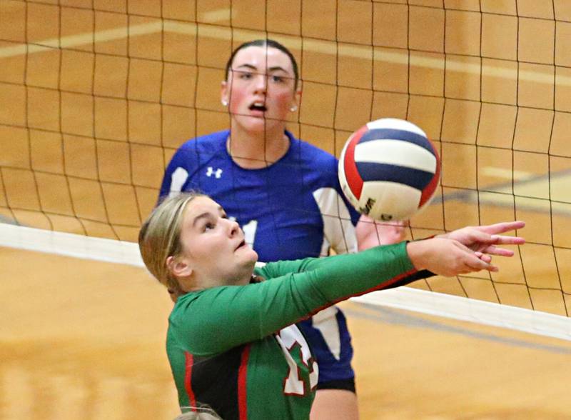 L-P's Emma Jereb hits the ball as Princeton's Keely Lawson watches from the other side of the net on Tuesday, Aug. 27, 2024 at Princeton High School.
