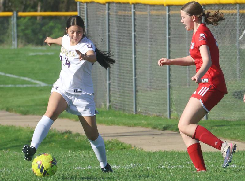 Serena/Newark/Earlville's Monica Sotelo makes a stop on the ball as Streator's Katherine Bressner defends on Thursday, April 16, 2026 at the James Street Recreational Complex in Streator.