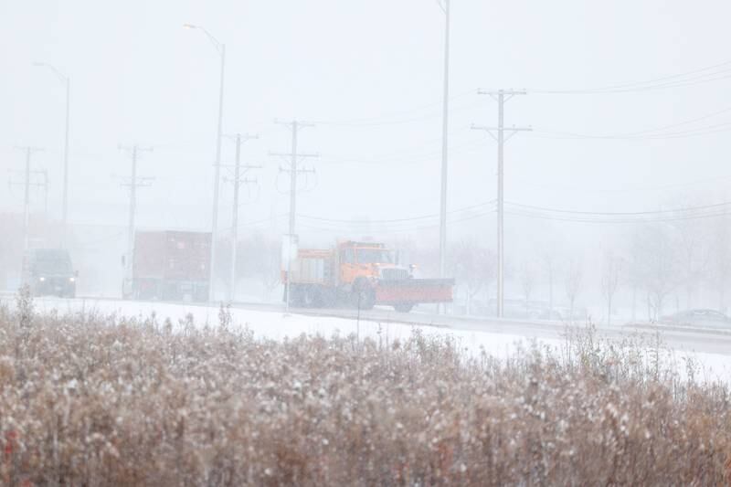 A salt truck works along West 143rd Street in Plainfield on Thursday, Nov. 21, 2024.