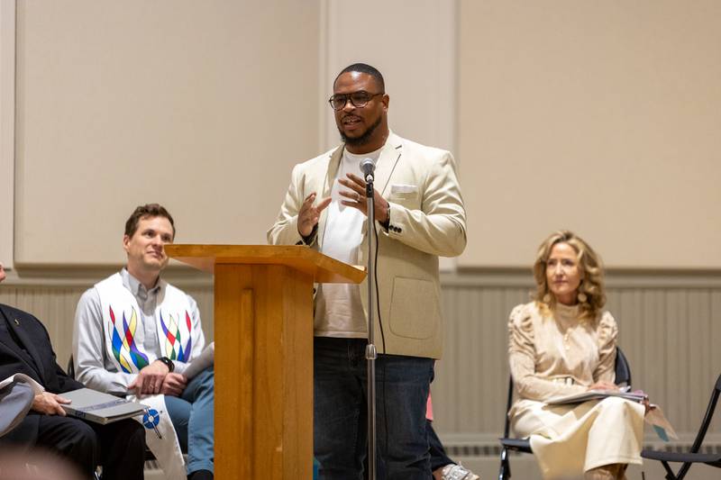 Associate Minister Jonathan Hudson speaks at the International Peace Vigil on Sunday, Nov. 23, 2025, at Shannon Hall in Batavia.