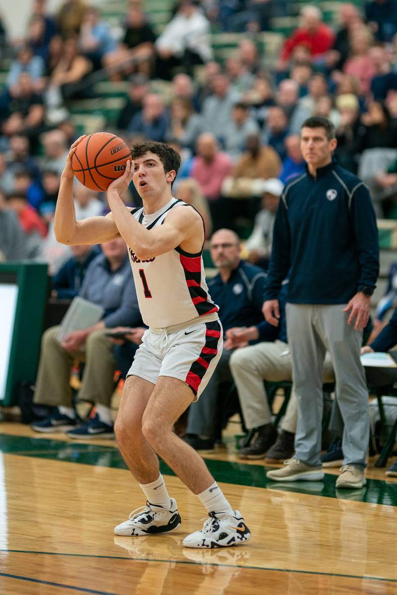 Benet’s Sam Driscoll (1) shoots a three-pointer against Lake Park during a Bartlett 4A Sectional semifinal boys basketball game at Bartlett High School on Tuesday, Feb 28, 2023.