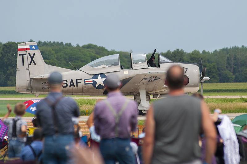 A pilot with the Trojan Phlyers team taxis down the runway after completing his performance. The team had two T28 Trojans at Saturday’s airshow.