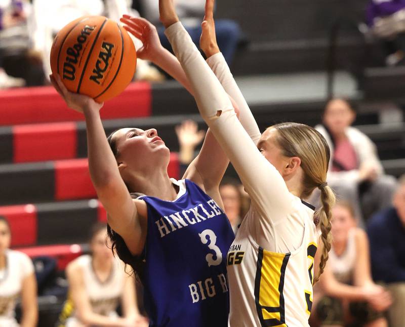 Hinckley-Big Rock's Mia Cotton shoots over Yorkville Christian's Grace Allgood during their Class 1A regional game Tuesday, Feb. 17, 2025, at Indian Creek High School in Shabbona.