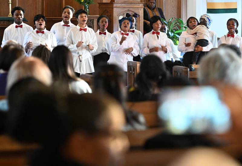 The Swahili Choir from Rockford performs during a Martin Luther King Jr. celebration at First United Methodist Church in Downers Grove Sunday.