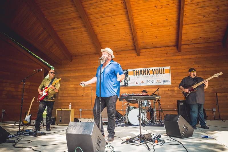 Brandon Santini performs at the Rhythm and BBQ Festival in Morris on Saturday.