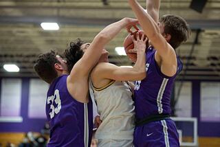 Sterling's JP Schilling is fouled going to the hoop against Rochelle in the regional finals Friday, Feb. 25, 20212.