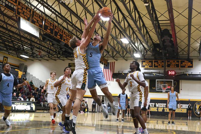Kankakee’s EJ Hazelett draws the shooting foul against Joliet West on Wednesday, Feb. 18, 2026 in Joliet.