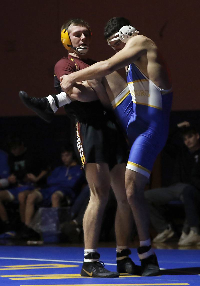 Richmond-Burton’s Breckin Campbelltries to take down Johnsburg’s Aaron Alvarez in the 190-pound match of a Kishwaukee River Conference wrestling meet on Thursday, Jan. 30, 2025, at Johnsburg High School.