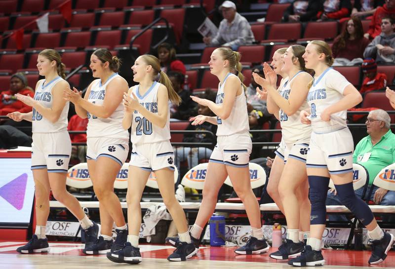 Members of the St. Edward girls basketball team react while playing Cissna Park during the Class 1A fourth place trophy on Friday, March 7, 2025 at CEFCU Arena in Normal.