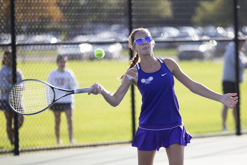 Dixon’s Leah Stees returns a shot against Sterling in a doubles match Thursday, Sept. 28, 2023 in Sterling.