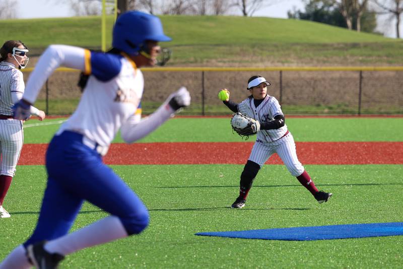 Kankakee's Mikaylah Santoyo throws to first for an out during the Kays 20-11 loss to Crete-Monee on Tuesday, April 7, 2026.