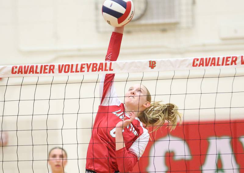 L-P's Maggie Boudreau reaches up to spike the ball during the Class 3A Sectional semifinal game on Tuesday, Nov. 4, 2025 in Sellett Gymnasium at L-P High School.