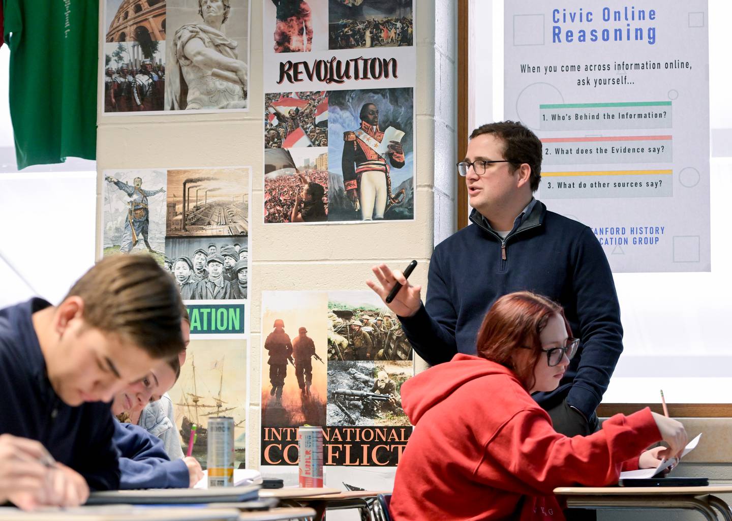 Geneva High School Social Studies Dept. Chair Lucas Rojas who received a $5,000 grant from the Jack Miller Center for the creation of a Wall of Honor for GHS veterans teaches a Government class on Monday, Feb 2, 2026 in Geneva.