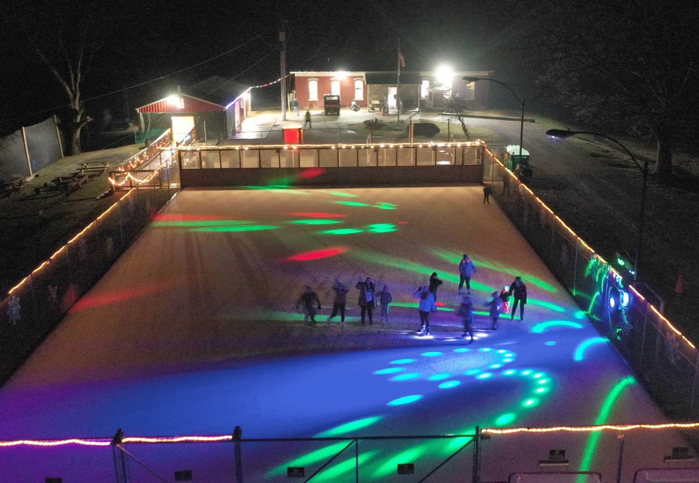 Disco lights accompanied by music fills the ice rink at Echo Bluff Park on Saturday, Dec. 9, 2022 in Spring Valley. The park has a chiller allowing skating all season long. The disco lights are every Friday night from 5-8p.m. Skating is available seven days a week. For additional times visit www.echobluff.org.