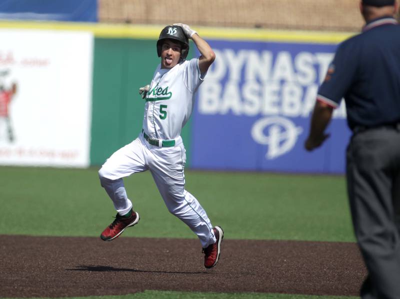 York’s Eli Maurer runs to second base for a double during a Class 4A state semifinal game against Edwardsville at Duly Health and Care Field in Joliet on Friday, June 9, 2023.