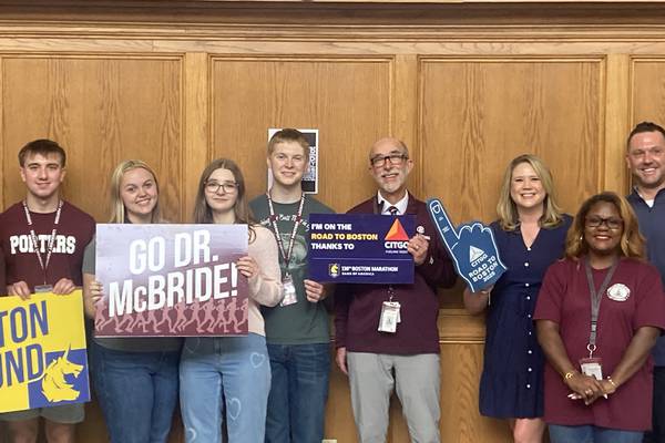 Lockport Township High School salutes superintendent as he prepares to run Boston Marathon