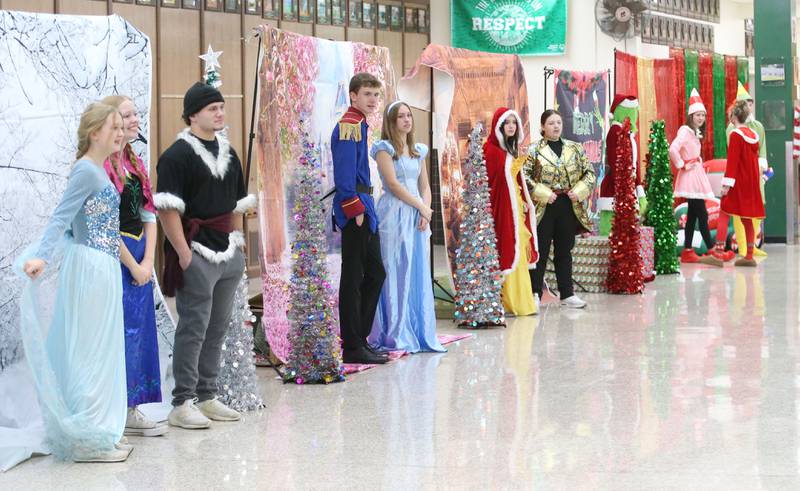 La Salle-Peru Township High School students dress in character as they meet children in the school cafeteria for the Santa's Workshop event on Saturday, Dec. 7, 2024 at L-P High School.