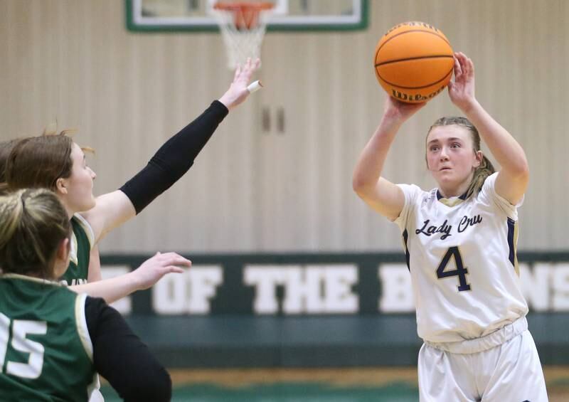 Marquette's Hunter Hopkins lets go of a jump shot against St. Bede during the Class 1A Regional semifinal game on Tuesday, Feb. 18, 2025 at St. Bede Academy.