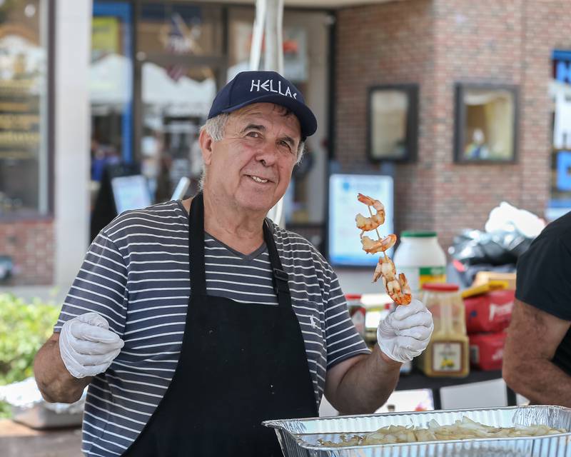A vendor at the Downers Grove Rotary GroveFest in downtown Downers Grove. June 24, 2023.