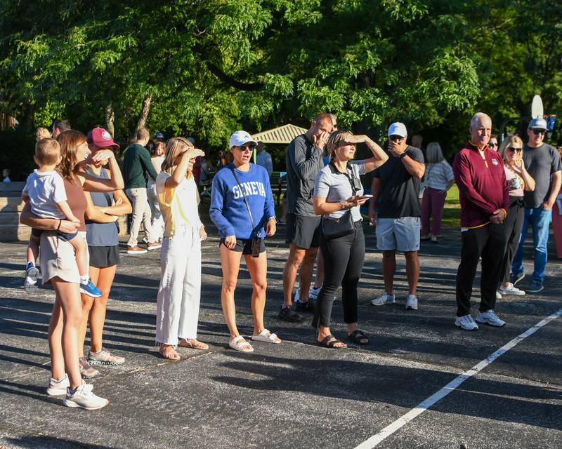 Friends and family watch as their students walk into school for the first day of class on Thursday Aug. 21, 2025, at Western Avenue Elementary School in Geneva.