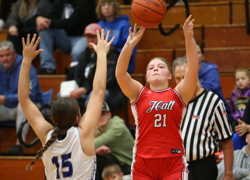 Hall's Ava Delphi shoots a jump shot over Princeton's Olivia Mattingly during the Princeton Holiday Girls Basketball Tournament on Saturday, Nov. 23, 2024 at Princeton High School.