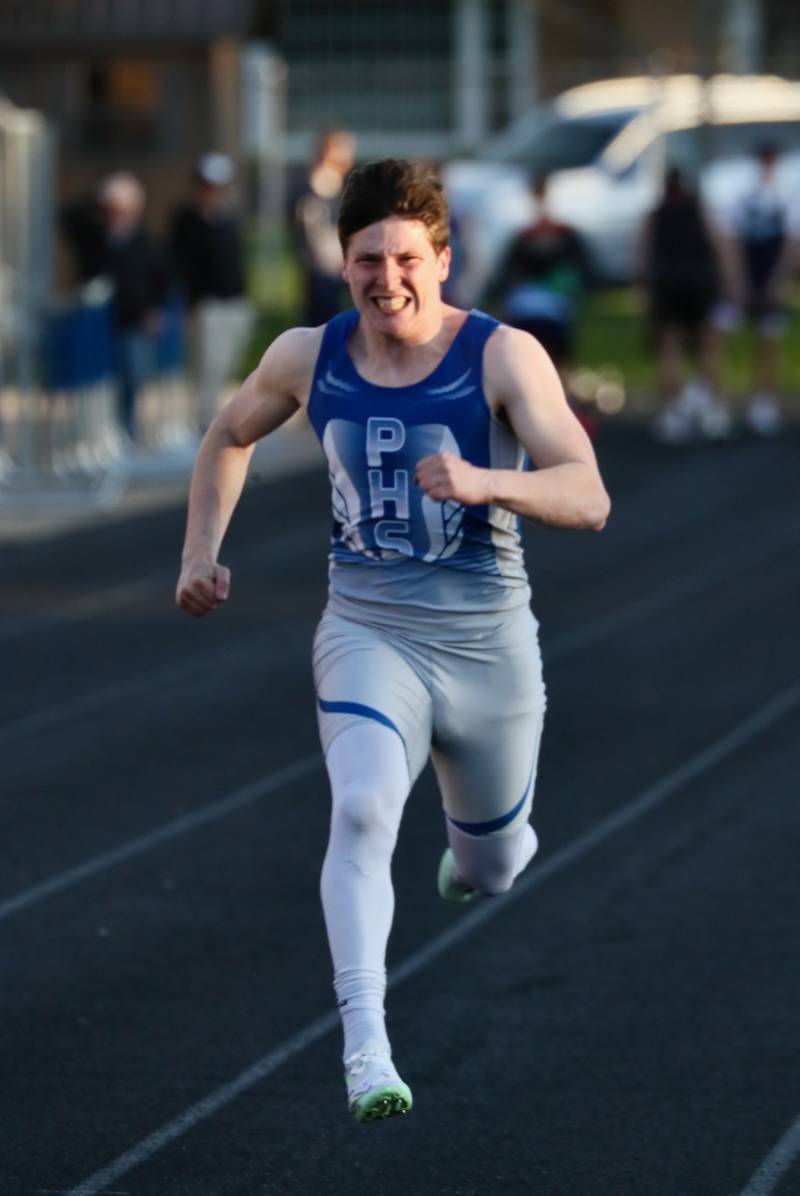 Princeton's Evan Driscoll hits the finish line in the 100 meters in Tuesday's Howard-Monier Invite.