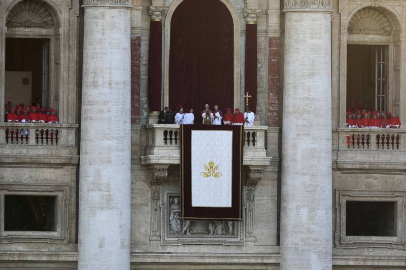 Pope Leo XIV appears on the balcony of St Peter's Basilica after his election, at the Vatican, Thursday, May 8, 2025. (AP Photo/Antonio Calanni)