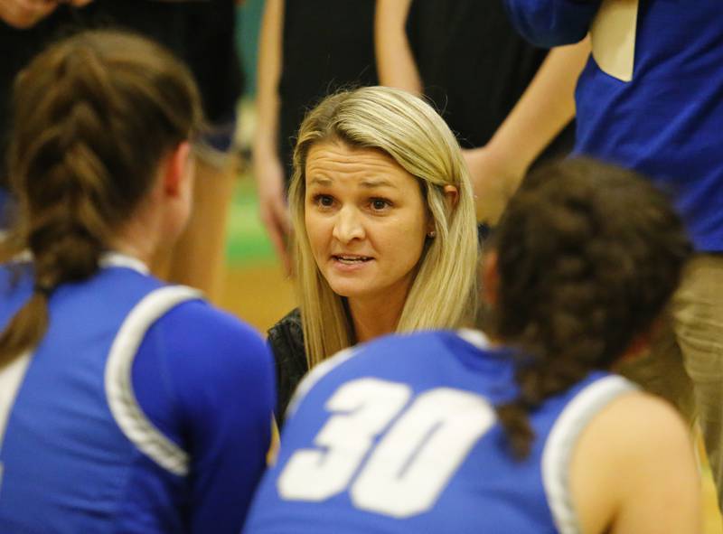Lyons' coach Meghan Hutchens talks to the team during the girls varsity basketball game between Lyons Township and York high schools on Friday, Dec. 16, 2022 in Elmhurst, IL.
