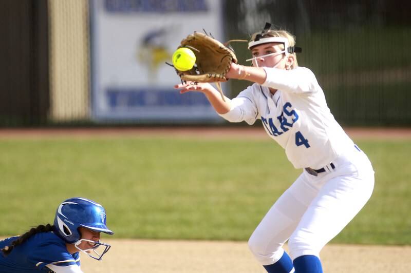 St. Charles North's Addy Umlauf makes a catch at second base during a game against Wheaton North on Tuesday, April 15, 2025 in St. Charles.